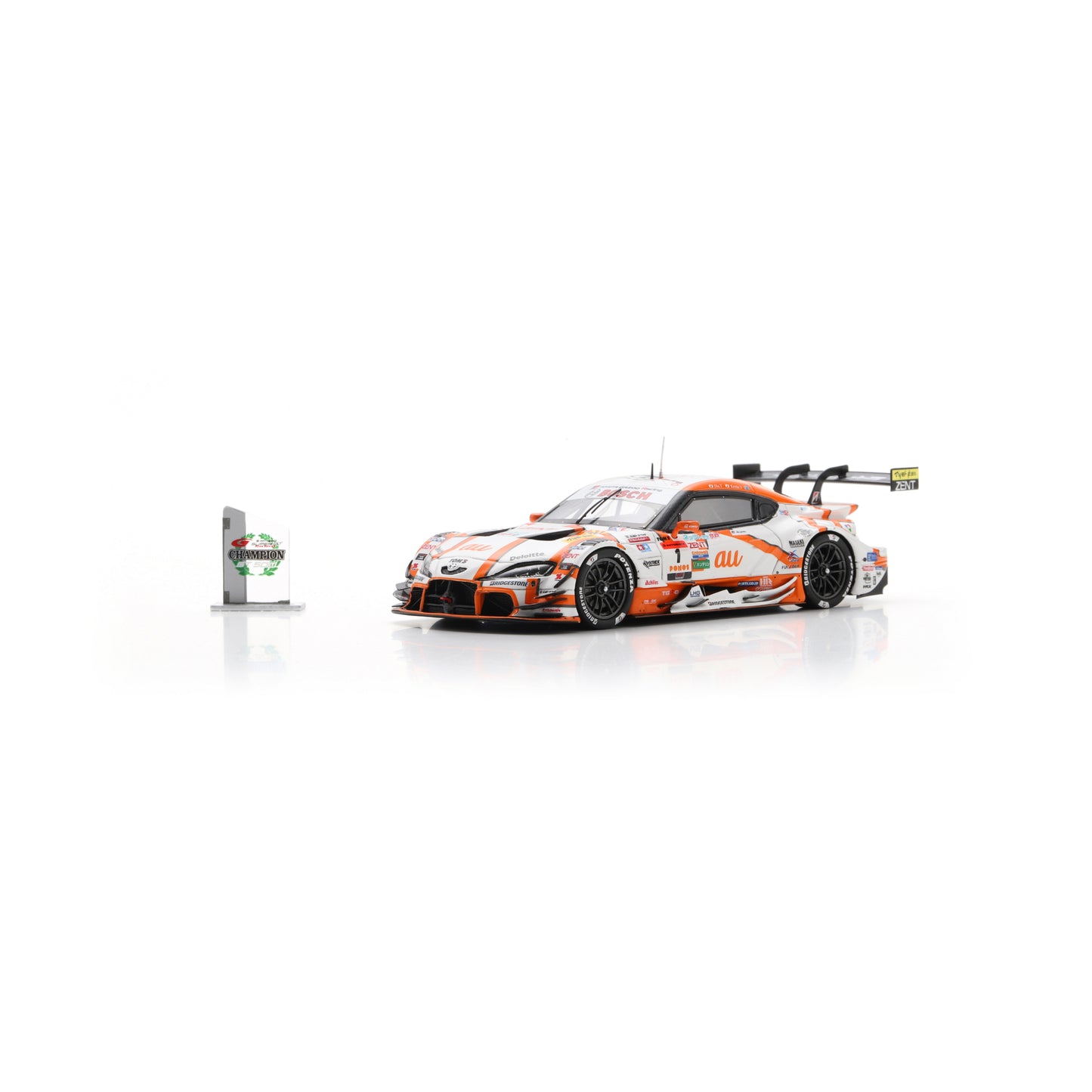 Spark 43SGT2025 1:43 - Toyota GR Supra TGR TEAM at TOM'S No.1 GT500 Class Champion SUPER GT 2025 S. Tsuboi - K. Yamashita with Champion board