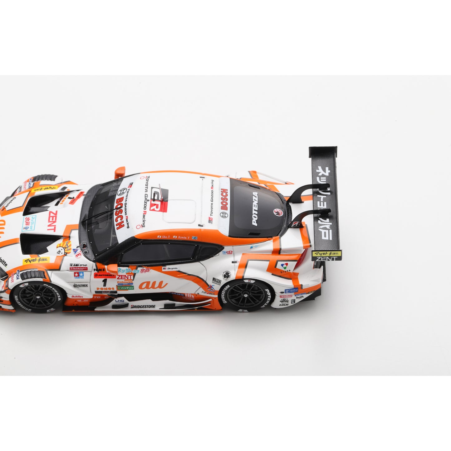 Spark 43SGT2025 1:43 - Toyota GR Supra TGR TEAM at TOM'S No.1 GT500 Class Champion SUPER GT 2025 S. Tsuboi - K. Yamashita with Champion board